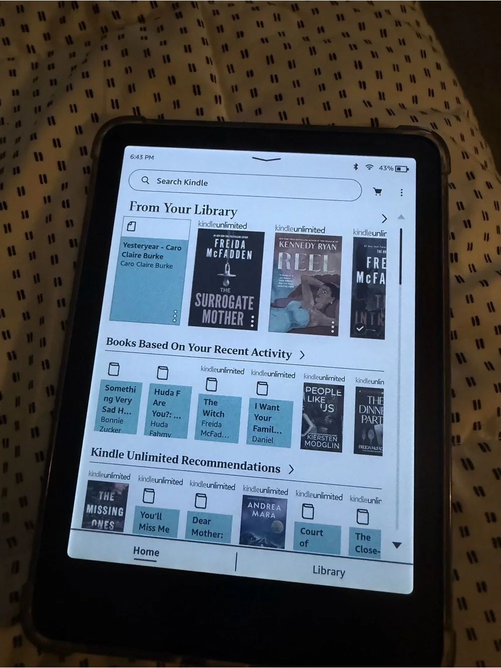 Amazon Kindle e-Reader in black with black case
